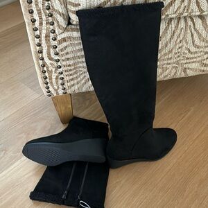 Shearling wedge with extra zipper for wider calves.